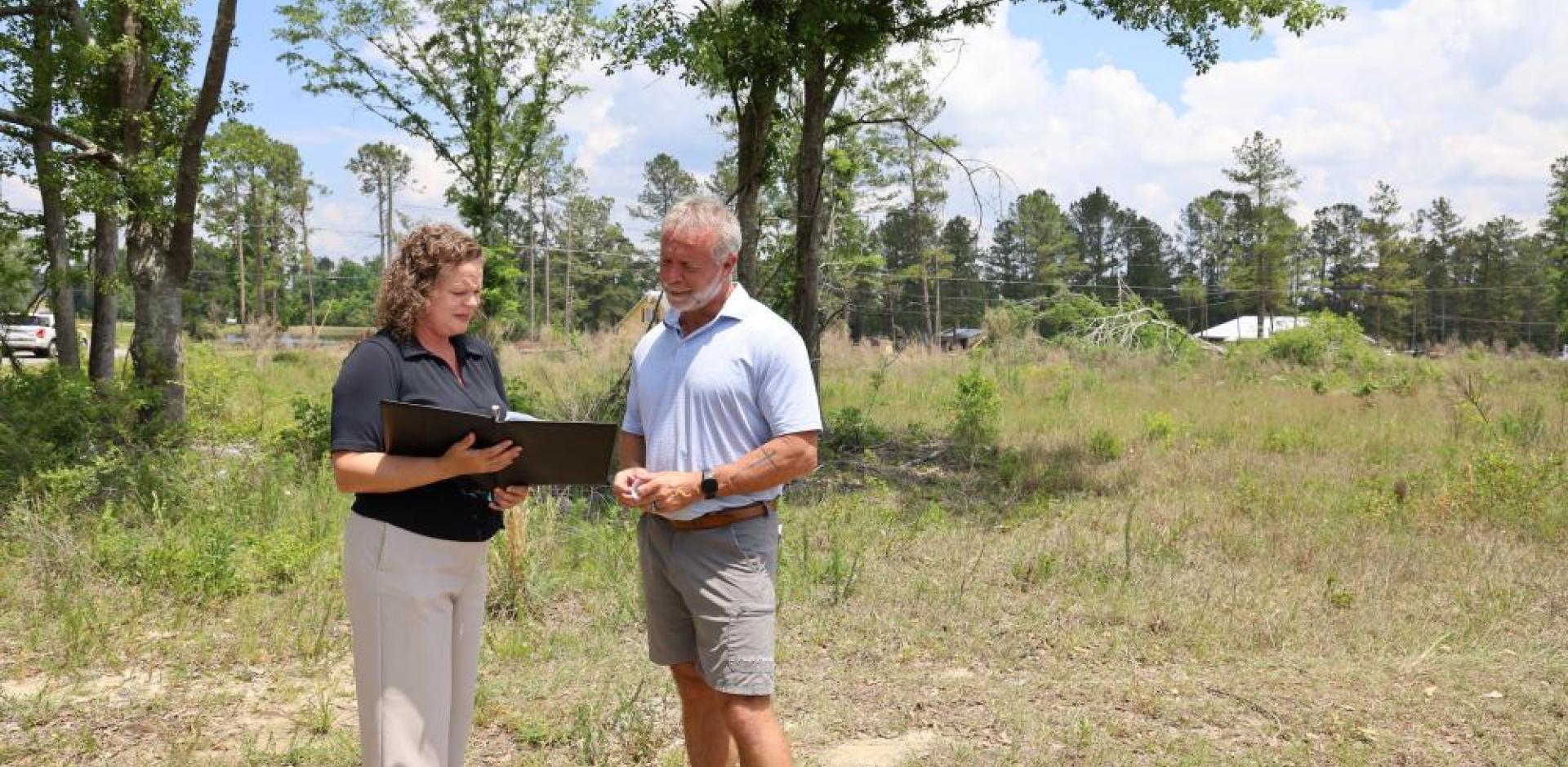 Amy and Mayor Bennett meet at the site in May 2025. Construction has not yet begun