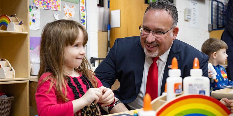 U.S. Education Secretary Miguel Cardona and student during his visit to eastern Kentucky