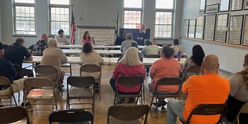 photo of residents attending a housing seminar.